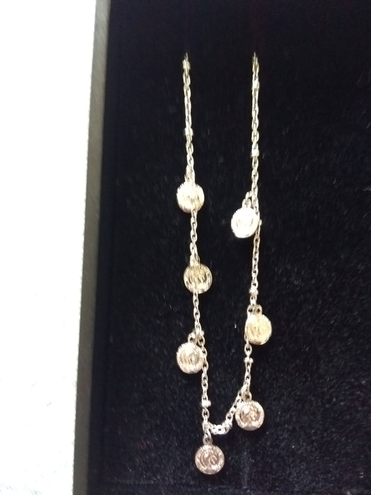 Ketting of armband met ronde hangertjes, muntjes zilverkleurig