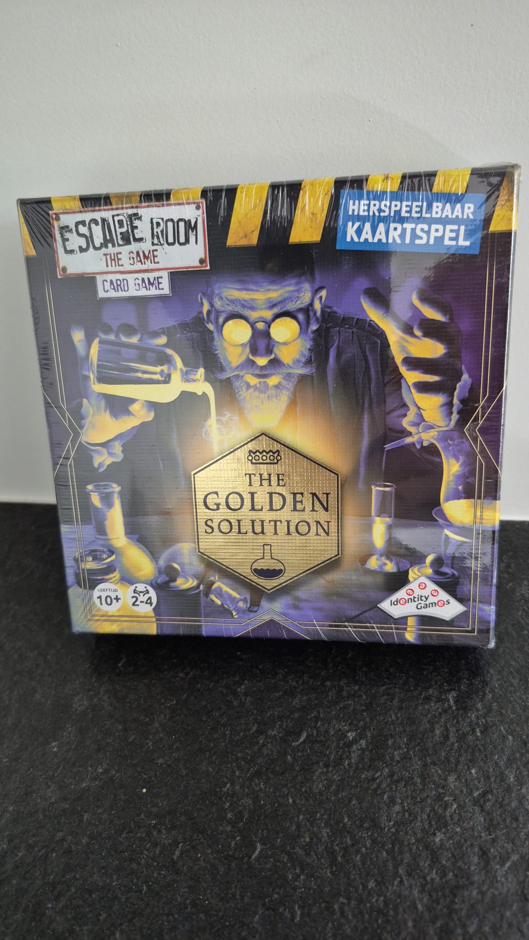 Escaperoom The game: The golden solution Identity games