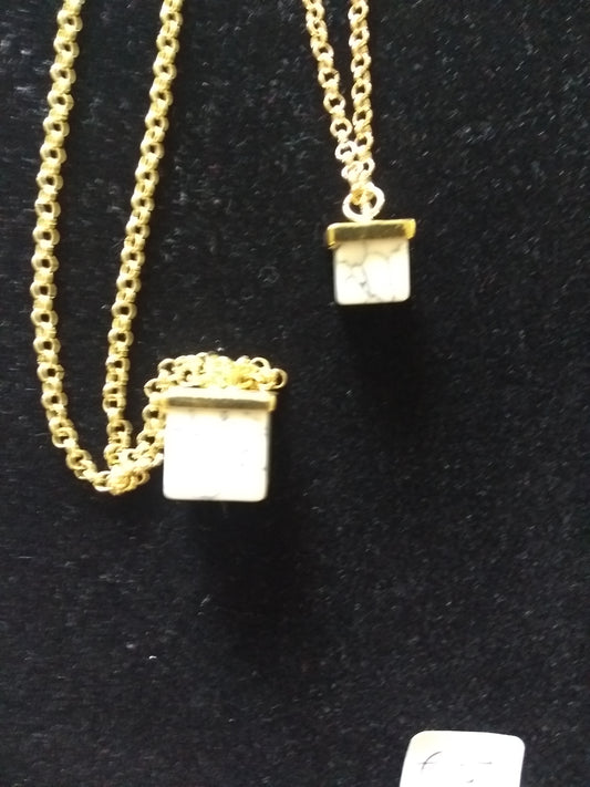 Ketting met dobbelsteen marmerlook